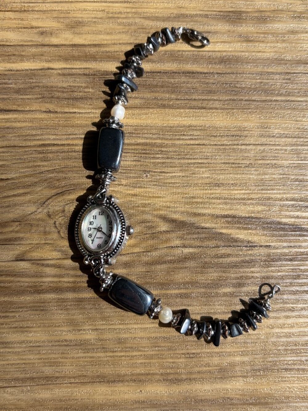 vintage geneva black and silver beaded with mother of pearl face watch OS